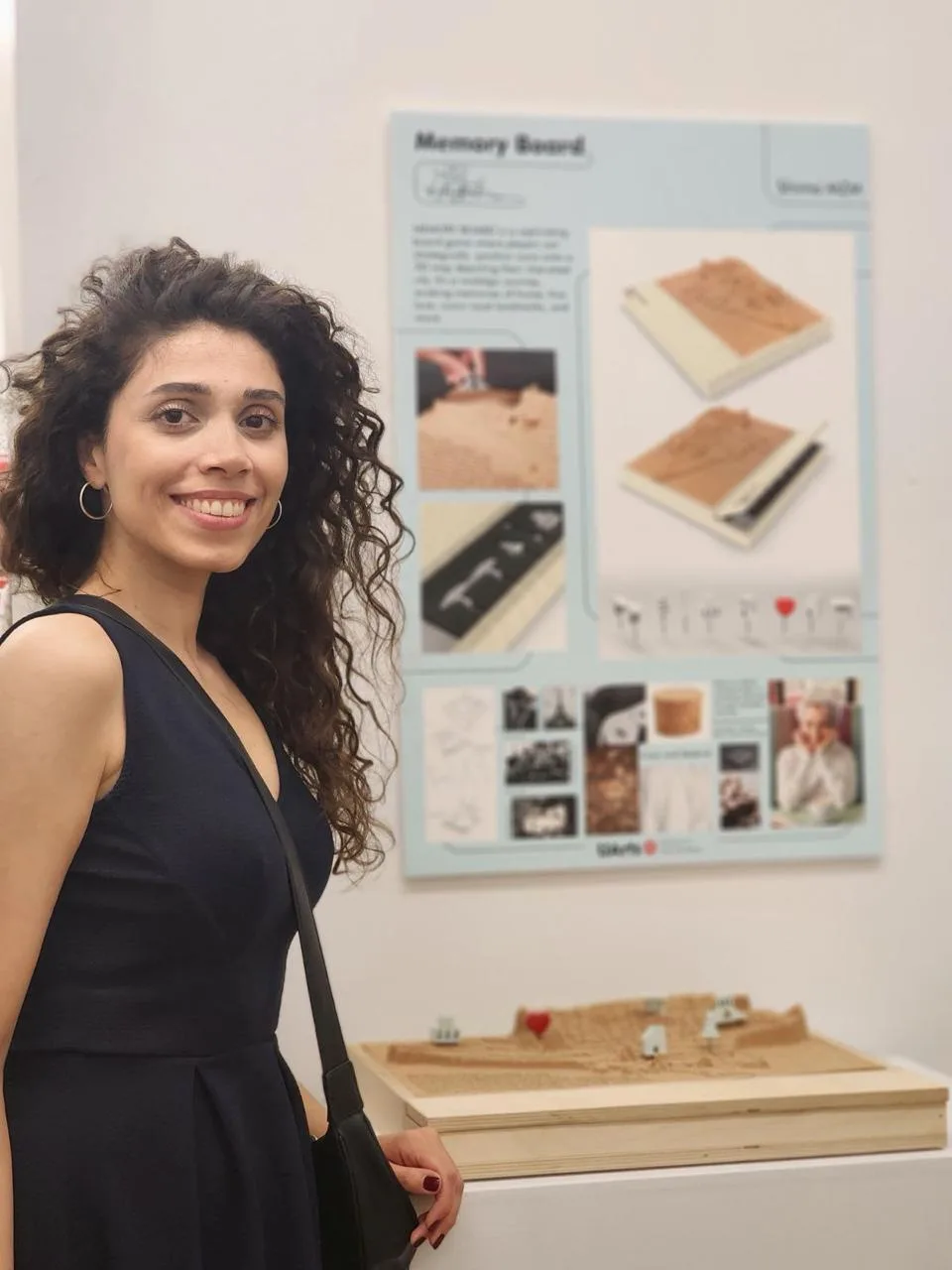Shima Mousavizadeh Markieh beside her Memory Board installation